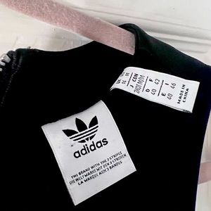 Addidas one arm jumpsuit -unique one of a kind statement.  Beyoncé inspired!